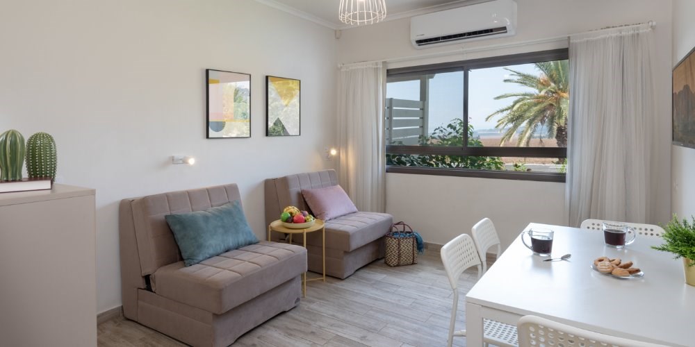 סוויטת גן עם מרפסת סלון -כפר הנופש מזרע